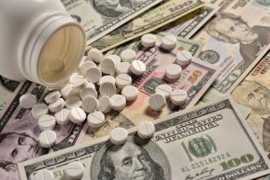 pills-on-top-of-money